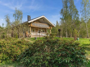Holiday Home Luonnonhelma